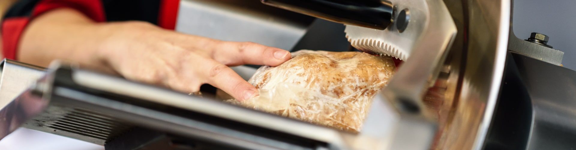 Affettatrici elettriche a gravità per salumi